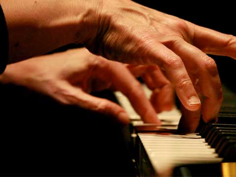 ¿Qué experto en compensación es un virtuoso del piano?